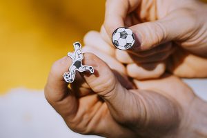 Holzbrosche Football player Brooch